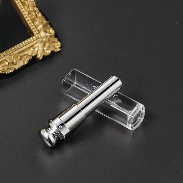 Dior Ball Top Slim silver lipstick tube with clear cap