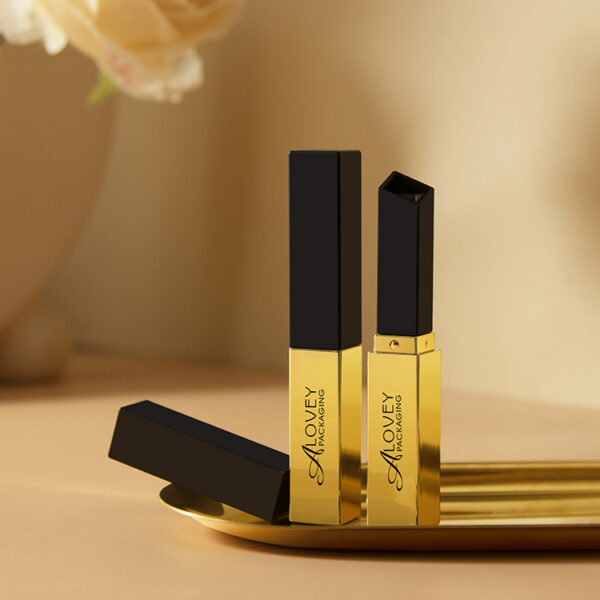 YSL Saint Laurent slim gold and black square lipstick tube