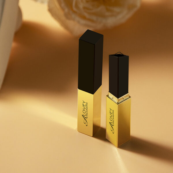 YSL Saint Laurent slim gold and black square lipstick tube